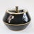 A handsome mid-century English ceramic tobacco humidor jar manufactured by Denby under their "Cross Keys" mark. This...
