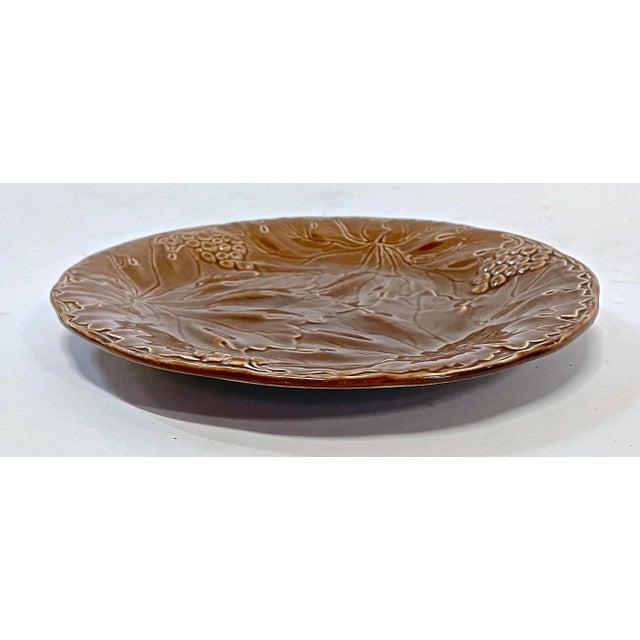 Vintage German majolica grape and leaf plate. Marked "HQ, Wächtersbach, HO" on the underside.