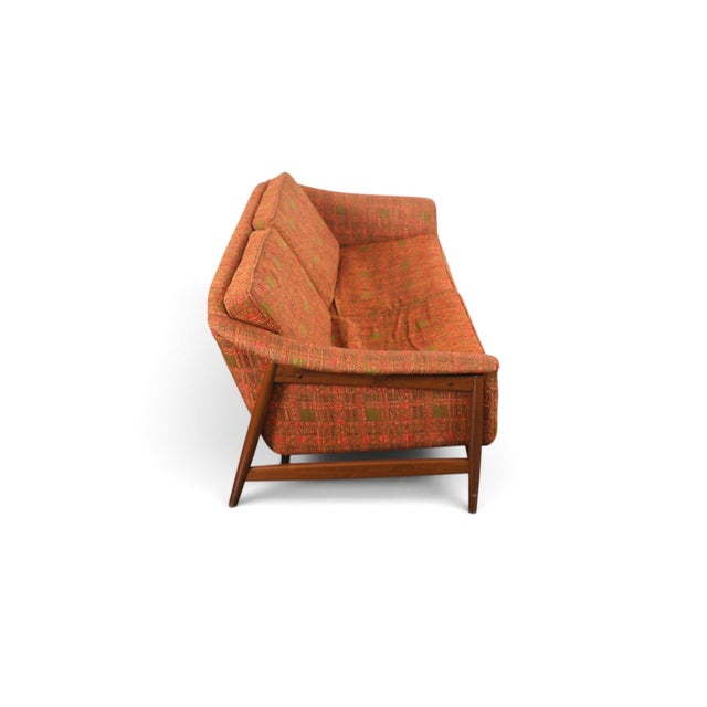 Origin: Sweden Designer: Folke Olhsson Manufacturer: DUX Era: 1960s Materials: Walnut, Wool Measurements: 61″ wide x 31″...