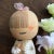 This adorable kokeshi, 'Hinagiku' style, is created by the renowned artist Aoki Ryoka. This particular piece, named 'Daisy...
