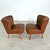 Dimensions: H 25.5” x W 21” x D 22” x SH 16.5” Pair of Vintage Cocktail chairs in brown faux leather with tapered legs....