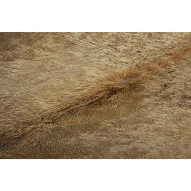 This handmade 7x8 contemporary cowhide rug from Rug & Kilim represents an exciting new collection of rare pieces in the...