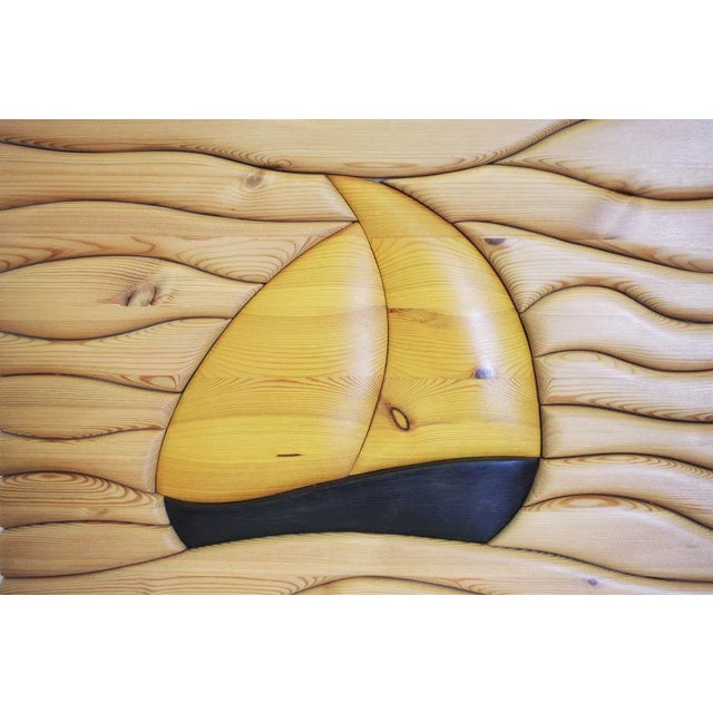 Pine wood painting with carved boat, natural color, made by a craftsman