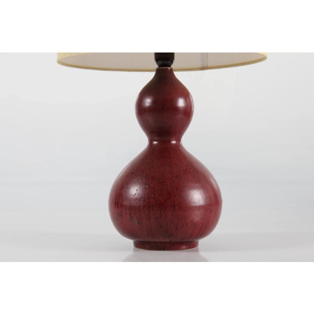 Rare stoneware table lamp no. 20658 designed by Axel Salto (1889-1961) The gourd- or calabash sharped lamp foot is...