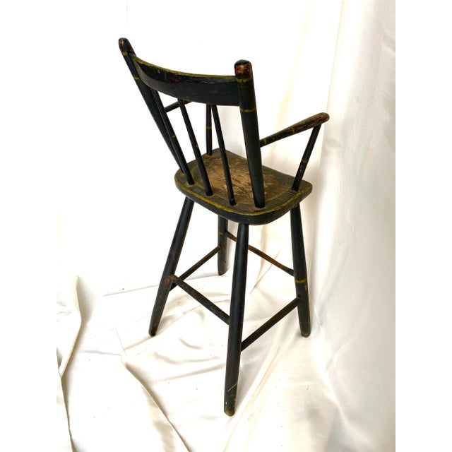 Adorable children’s Windsor high chair with original paint, circa 1820. Sturdy and level, use as plant stand, side table,...