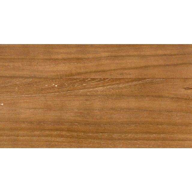 This lovely Quinnton platform bed has been beautifully handcrafted of teak. Its dominant decorative features are a...