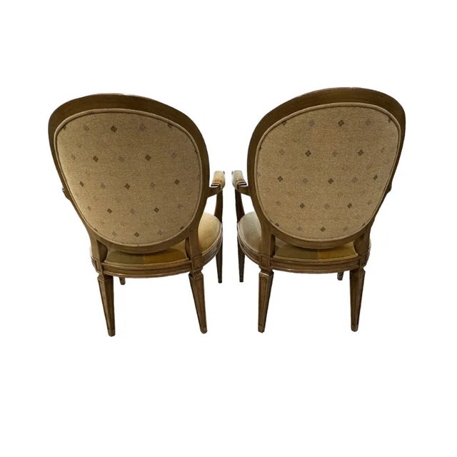 Very nice and large French Provincial armed dining chairs. The seat and seat back have a split colored mohair fabric in...