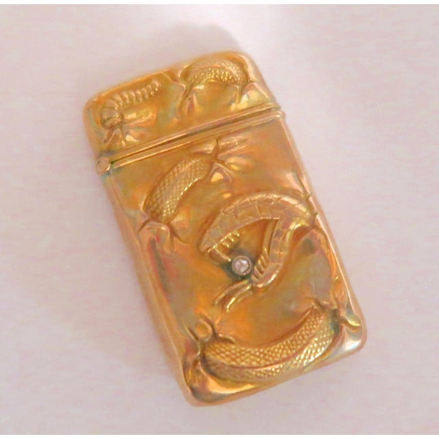 This is an antique Japanese match safe with a very well-detailed dragon on front in high relief. The Japanese match safes...