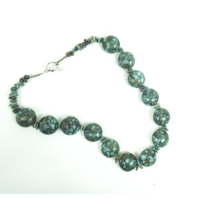 Late 20th century chunky mosaic bead turquoise necklace. Each large bead is 1" dia. x .5" thick, puffy disc shape with...