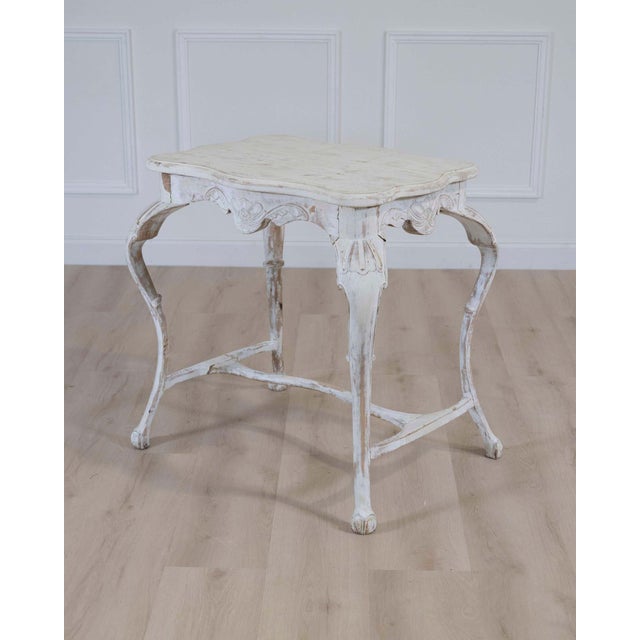 Made in Sweden in the nineteenth century, this table has a top measuring approximately twenty-nine inches in length by...