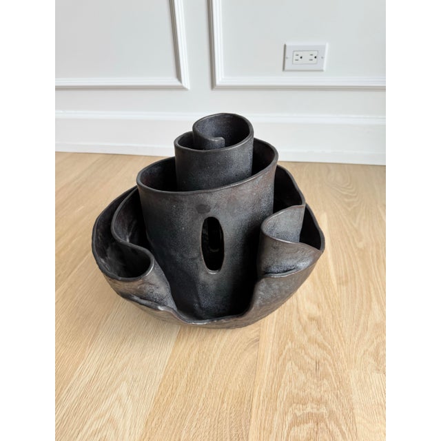 Exceptional monumental 1970s studio pottery sculpture featuring an organically coiled spiral form with striking...