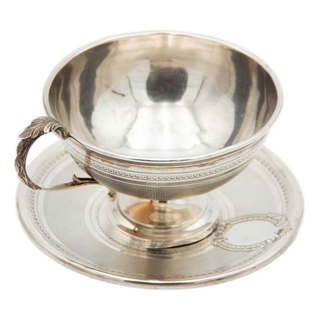 Embossed Teacup with Guilloche Silver Saucer For Sale