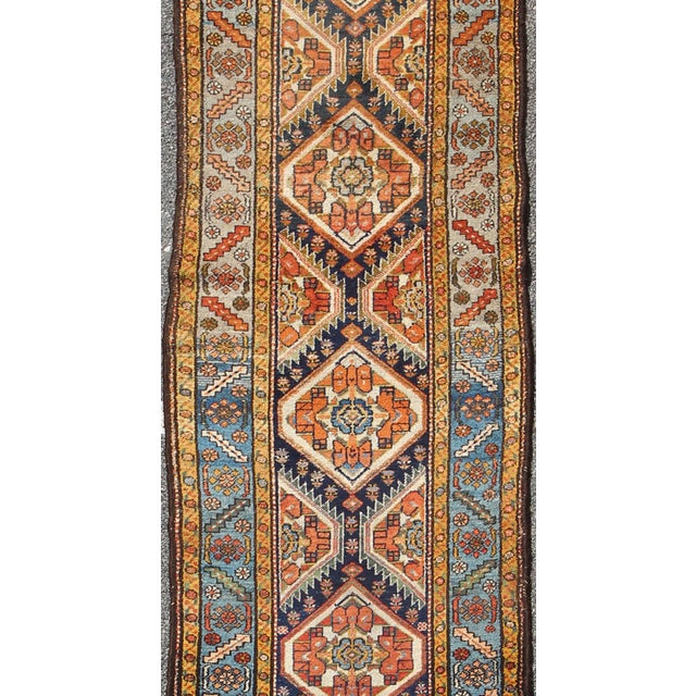 Measures: 3' x 13'7 Colorful 1920s Antique N.W. Persian Runner with Sub-Geometric Medallions, Keivan Woven Arts . rug...