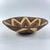 This handwoven basket from Botswana reflects a long-standing tradition of fiber artistry shared across southern Africa,...
