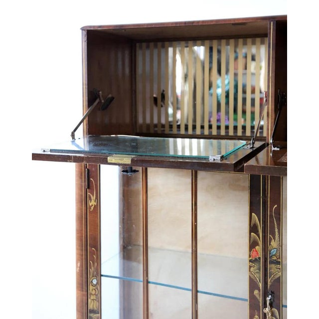 This is a cabinet from between 1950 and 1960. It is from Tunbridge of London. The cabinet is a rare collectors item. The...