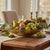 Handcrafted in Turkey, this striking art glass centerpiece bowl features textured clear glass with shimmering reverse-...
