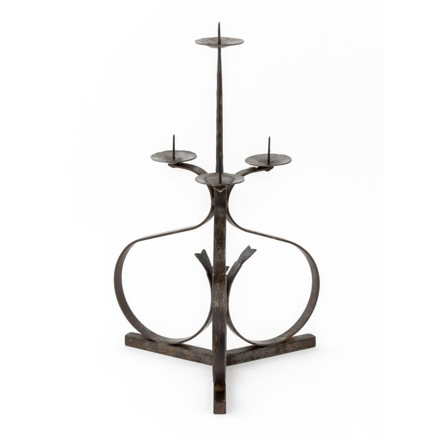 Arts and Crafts Wrought Metal 4-Branch Candelabra, with three candle prickets surrounding elevated central stem. 23.5" H x...