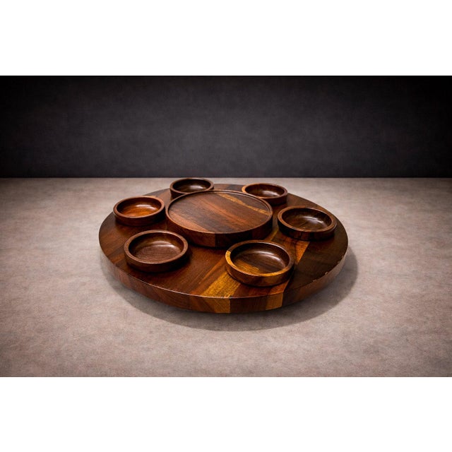 Produced by Tropic Art, Brazil, circa 1970s, this rosewood Lazy Susan exemplifies the intersection of utility and material...