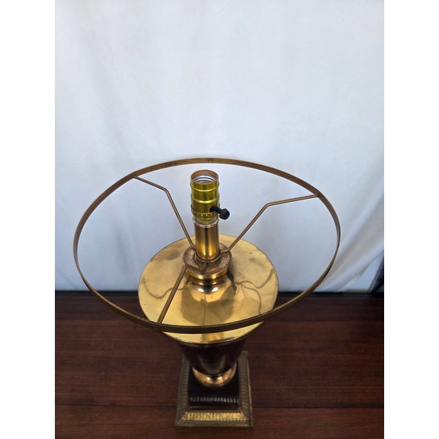 This striking vintage table lamp blends bold color with architectural form, featuring a rich purple crackle-finish metal...