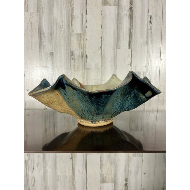 Multi-colored Post Modern clam shell design bowl with many different textures and patterns, some floral with repetitive...
