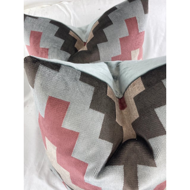 Custom pair of 22" pillows covered in Kravet "Qatari Velvet" in color rosewood and backed in a coordinating silver/blue...