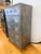 Industrial steel storage chest with a clean, utilitarian silhouette and wonderful timeworn patina. This substantial five-...