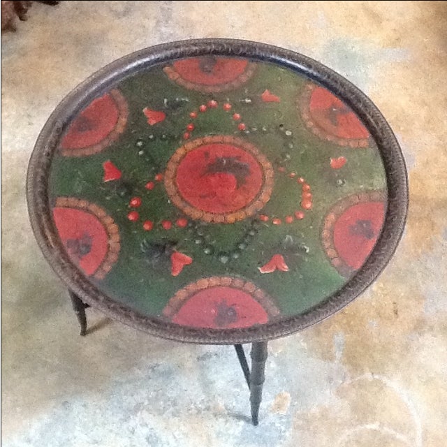 Offered is a Russian tray table with a lovely rose motif. It's a great piece for your eclectic collection.