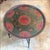 Offered is a Russian tray table with a lovely rose motif. It's a great piece for your eclectic collection.