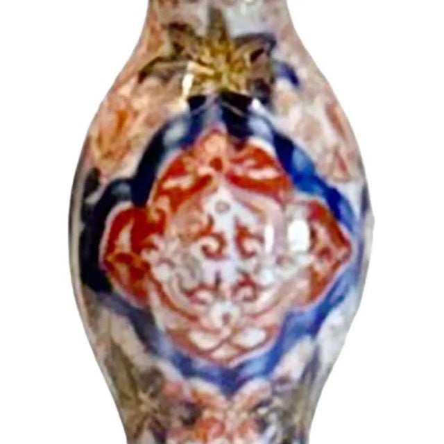 Japanese Imari vase from the 1800s in a beautifully decorated gourd shape. Small but important.