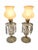 A charming pair of vintage 1950s Hollywood Regency boudoir lamps featuring beautifully molded crystal-style bases,...