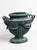 Elegantly detailed and commanding in presence, this Neoclassical style cast iron urn brings timeless European...