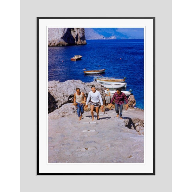 Lobster and Crab Catch by Toni Frissell Local fisherman carry their fresh catch of Lobsters and Crab from sea. (Toni...