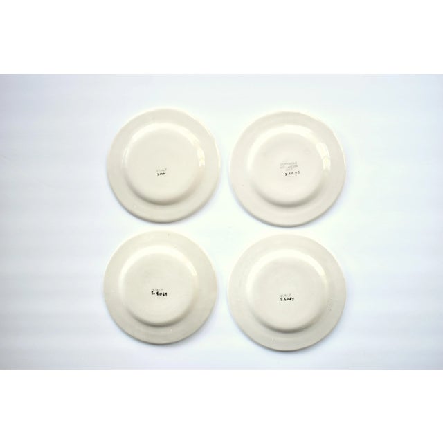 This is is a set of four (4) vintage small dessert, bread, or canape plates, printed with black and white neoclassical...