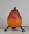 Schneider A French art deco lamp in wrought iron made circa 1925-1930. It holds a beautiful coloured shade in mottled...