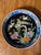 A striking vintage Chinese decorative porcelain plate featuring a richly detailed pair of exotic long-tailed birds perched...