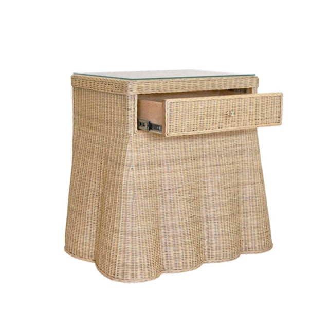 ONE DRAWER RECTANGULAR SIDE TABLE WITH FLARED SCALLOPED BASE IN RATTAN WITH GLASS TOP Features & Attributes: 29 inches...