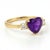 Amethyst Heart Three-Stone Ring This elegant ring showcases the captivating beauty of an amethyst gemstone, designed in a...