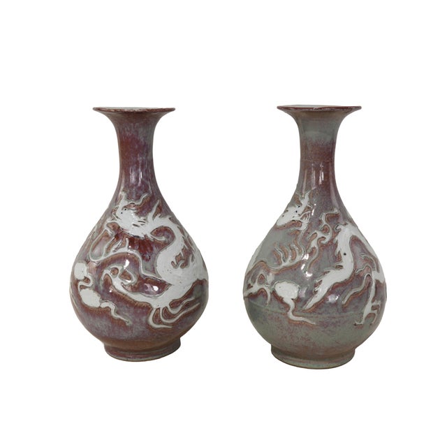 These precious pieces are 10 inches high and 9 inches in diameter. Their robust and elegant forms perfectly reproduce the...