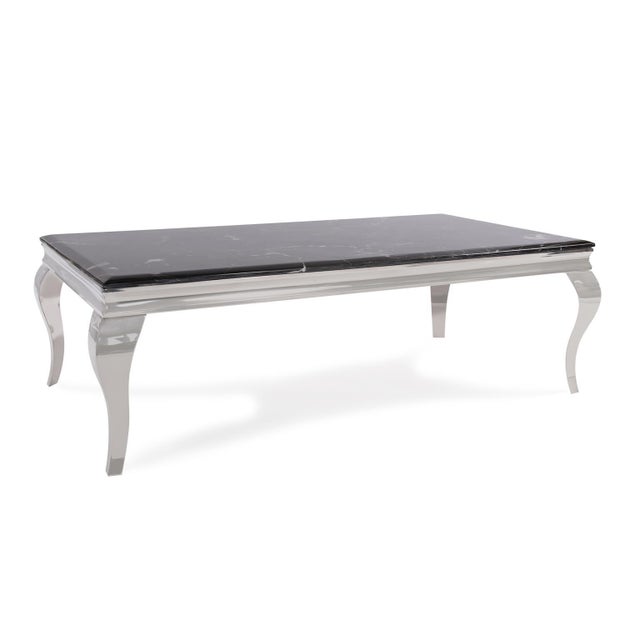 Beautifully hand crafted cabriole legs in polished stainless steel with a sleek black marble surface blend together to...