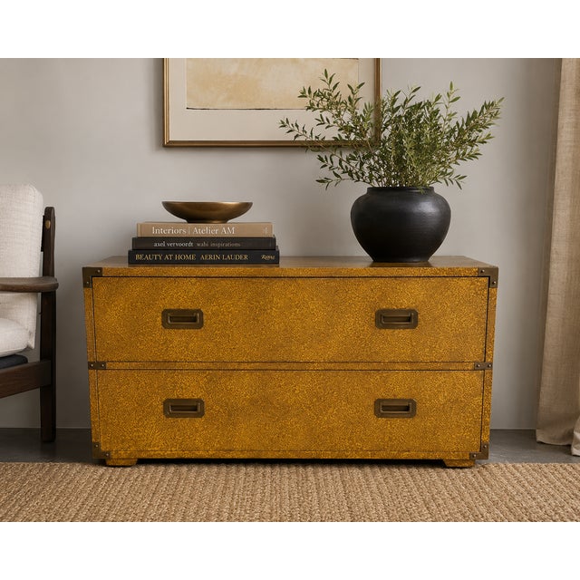 A striking Henredon Fine Furniture campaign-inspired two-drawer chest featuring a rich golden faux shagreen finish and...