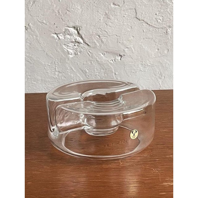 This exceptional Peill & Putzler glass ashtray represents the innovative spirit of German glassmaking from the mid-20th...