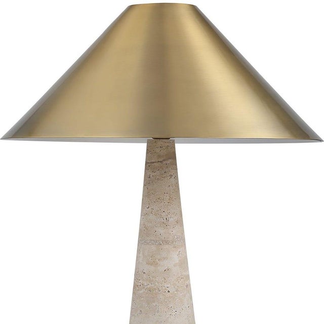 A striking blend of sculptural form and natural texture, this table lamp features a dramatically tapered metal shade in a...