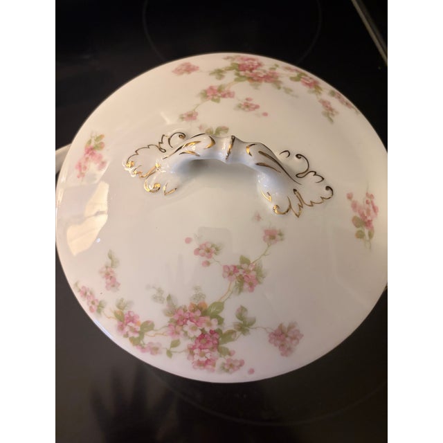 An exquisite antique porcelain covered round vegetable serving dish/casserole tureen produced by Royal Schwarzburg in...
