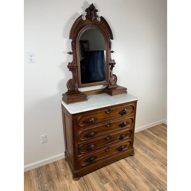 This splendid Antique Victorian dresser, crafted circa 1900, exemplifies the grandeur and meticulous craftsmanship...