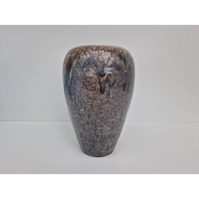 Large ceramic vase by Josef Hehl (1885-1953). Gray running glaze. In the underside, TH (pottery Hehl) is ground at the...