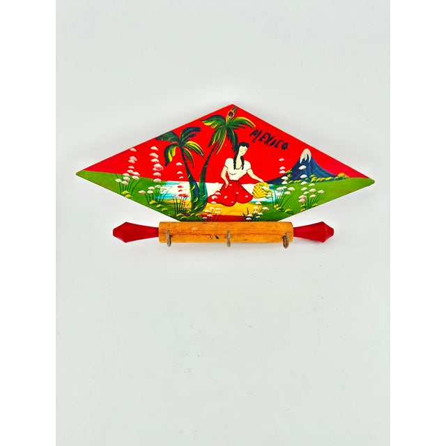 Vibrant vintage key holder. Made in Mexico. Solid wood. Folk art style. Perfect to add to help you keep track of your...