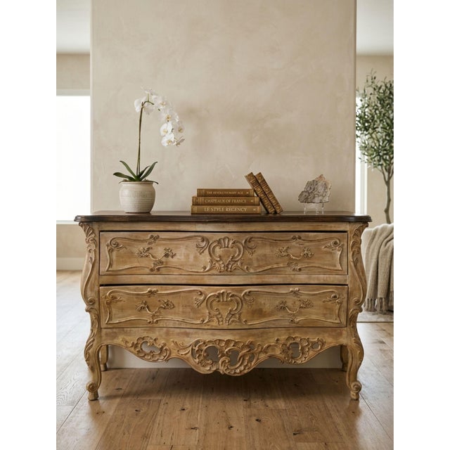This vintage Lewis Mittman bombe-style chest of drawers is a masterful interpretation of classic French Provincial design,...