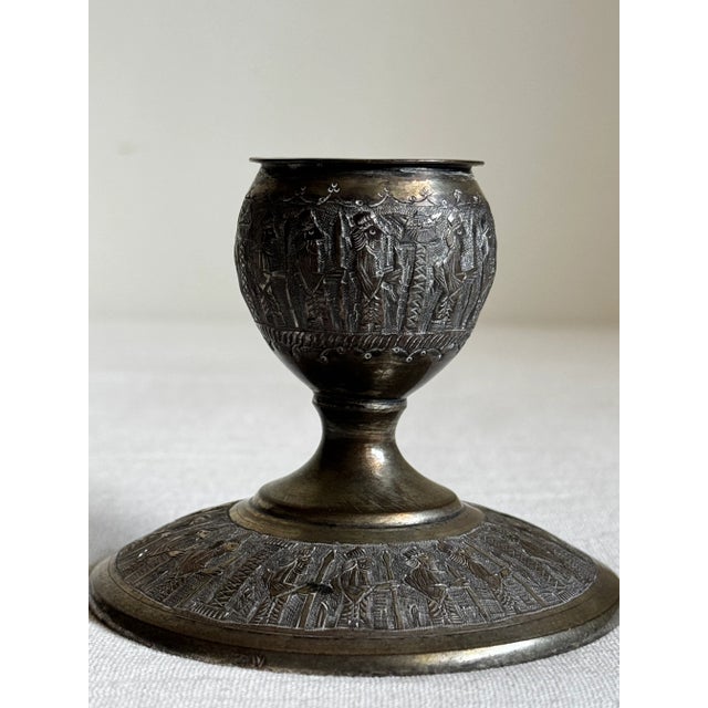 This finely crafted pair of late 19th- to early 20th-century Persian candle holders reflects the rich artistic heritage of...