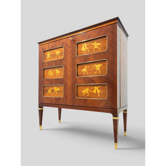 This extraordinary bar cabinet, designed by Paolo Buffa and produced in Italy during the 1950s, is a superb example of the...