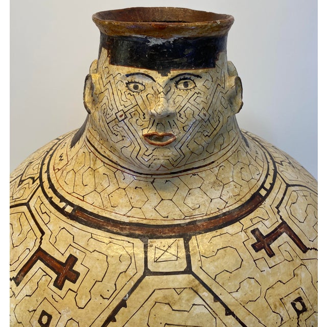Monumental Amazonian Shipibo-Conibo Anthropomorphic Pottery Vessel with Kené Patterning, Peru A rare and visually...